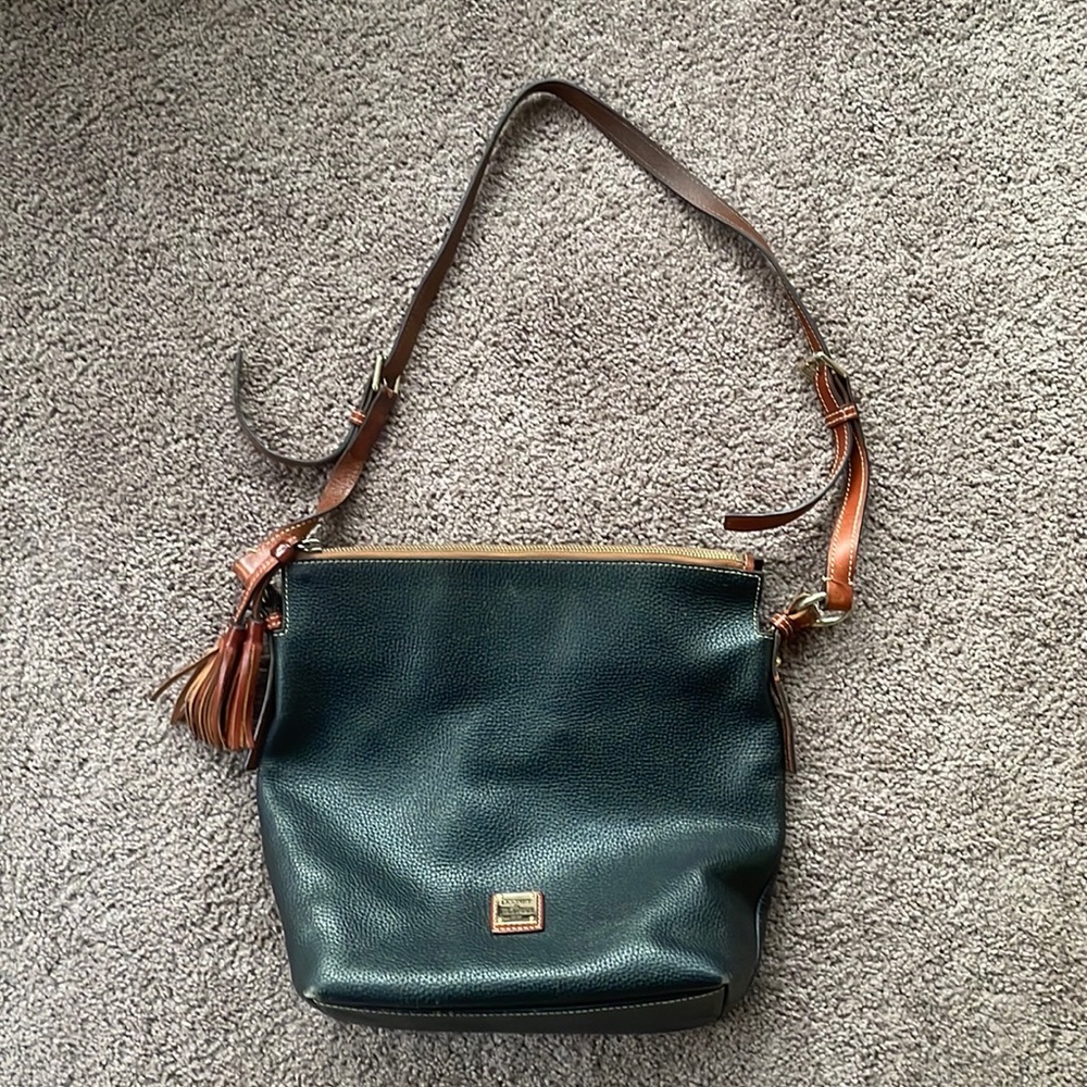 Dooney and Burke cross shoulder bag. Gently used. Black with brown leather strap